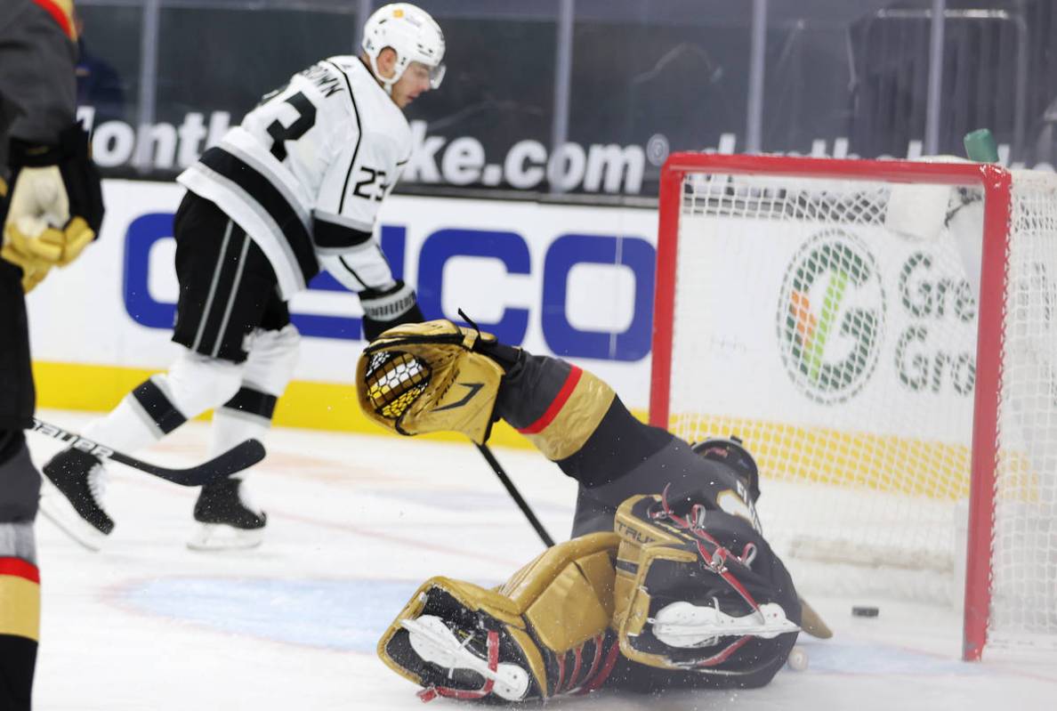 Los Angeles Kings right wing Dustin Brown (23) scores a goal against Vegas Golden Knights goalt ...