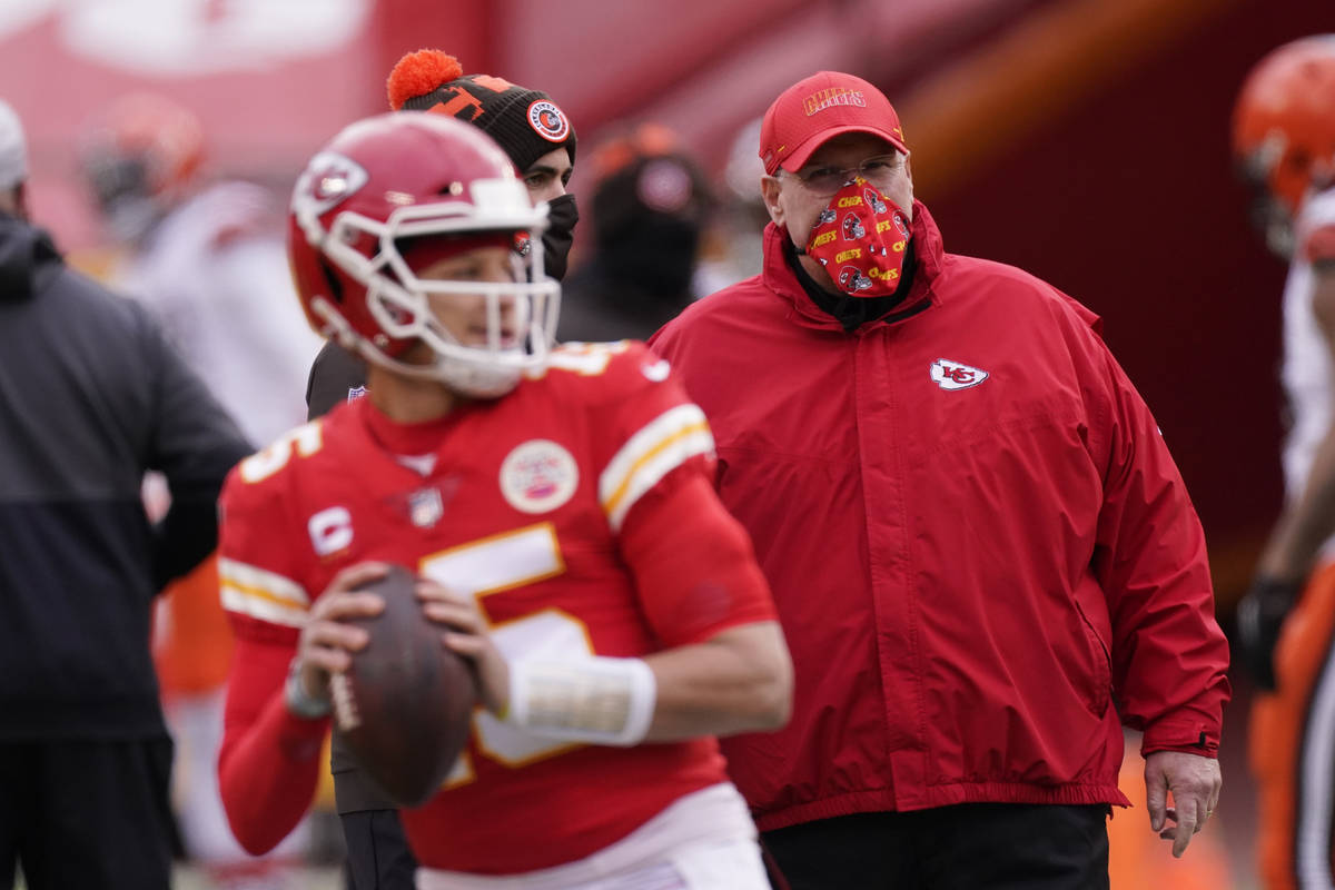 In this Sunday, Jan. 17, 2021, file photo, Kansas City Chiefs head coach Andy Reid, right, watc ...