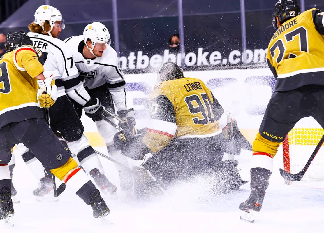 Golden Knights goaltender Robin Lehner (90) blocks the puck in front Los Angeles Kings left win ...