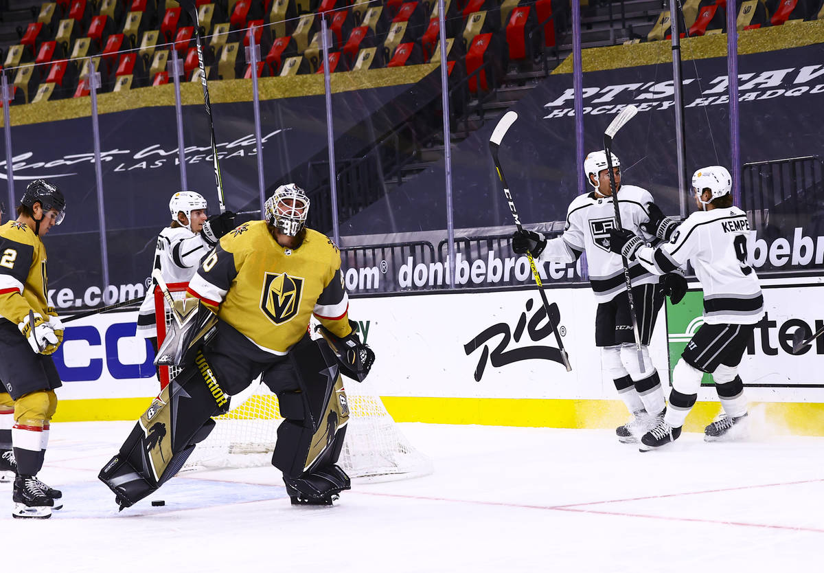 The Los Angeles Kings celebrate after a goal against Golden Knights goaltender Robin Lehner (90 ...