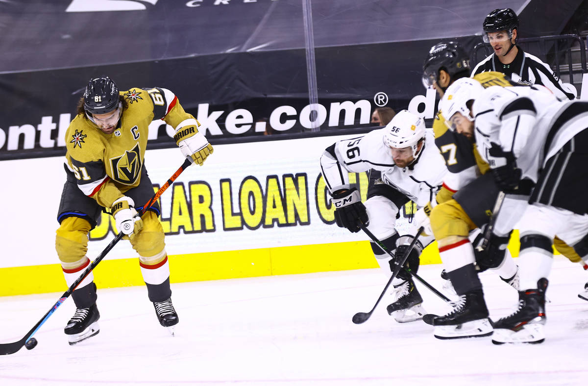 Golden Knights right wing Mark Stone (61) skates with the puck in front of Los Angeles Kings de ...