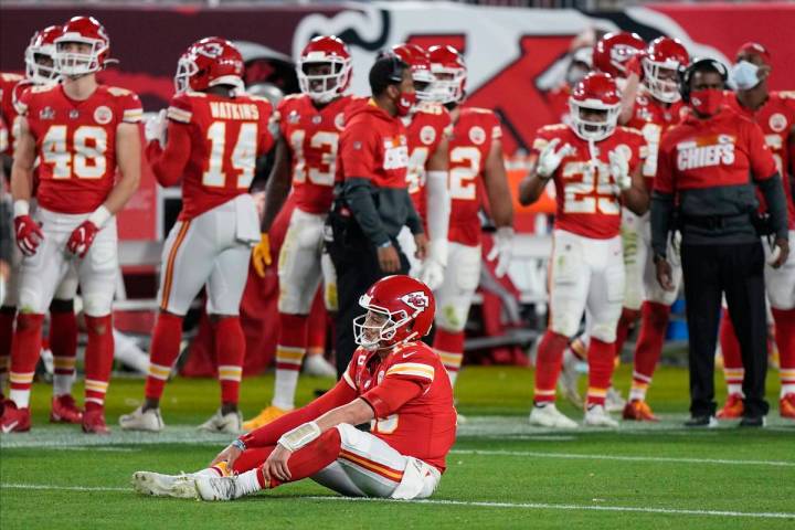 Kansas City Chiefs quarterback Patrick Mahomes (15) sits on the turf during the second half of ...