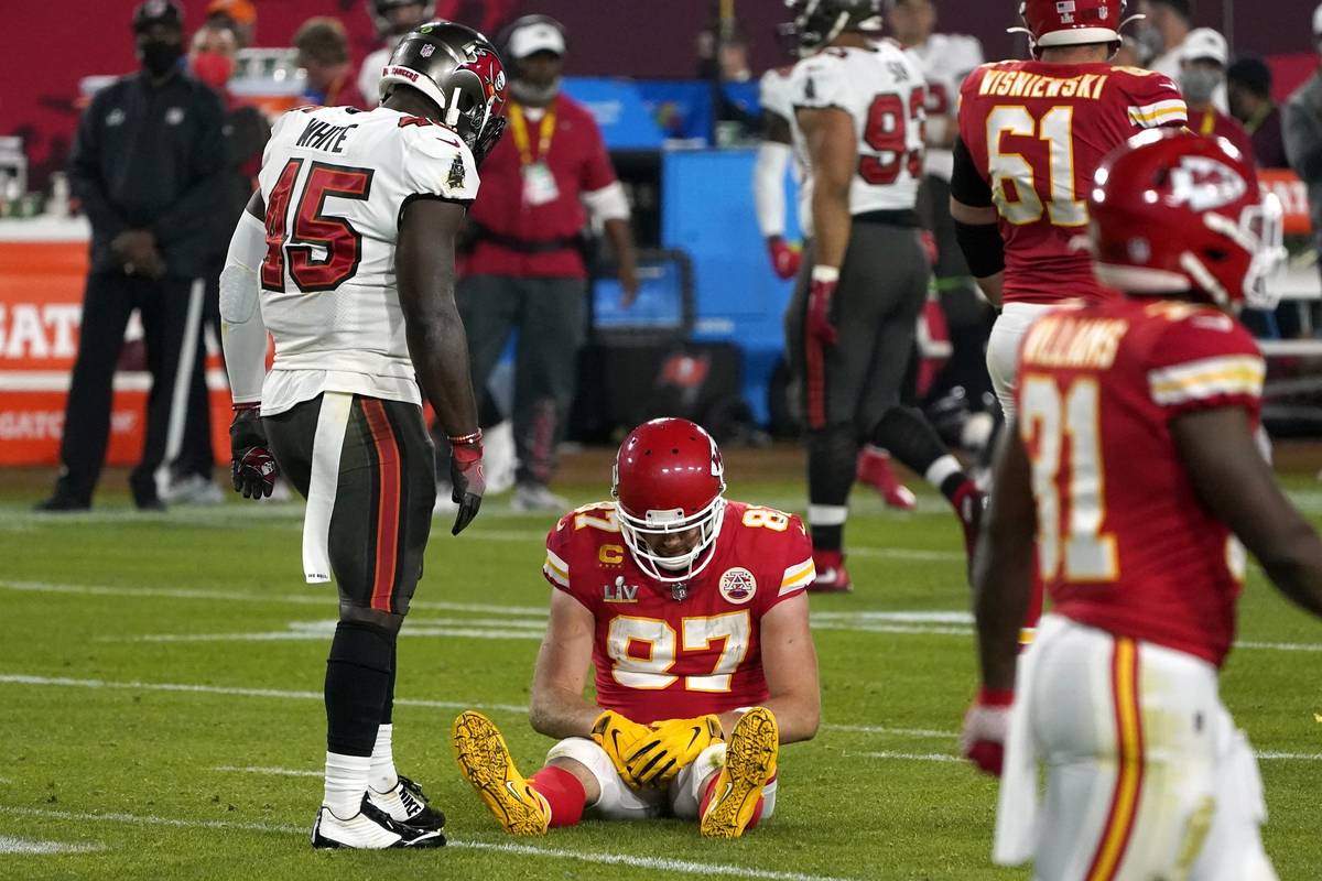 Kansas City Chiefs tight end Travis Kelce (87) sits on the field after an incomplete pass as Ta ...