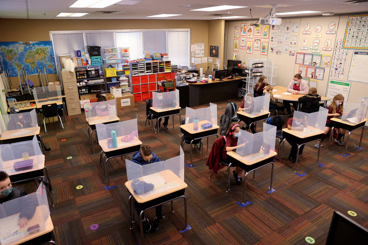 Students work in Joyelle Sampon's first grade class during school at Coral Academy of Science L ...