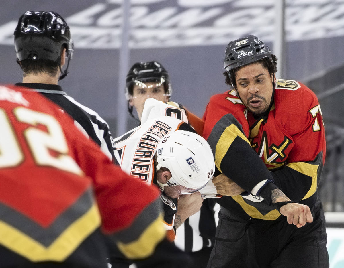 Vegas Golden Knights right wing Ryan Reaves (75) fights Anaheim Ducks left wing Nicolas Deslaur ...