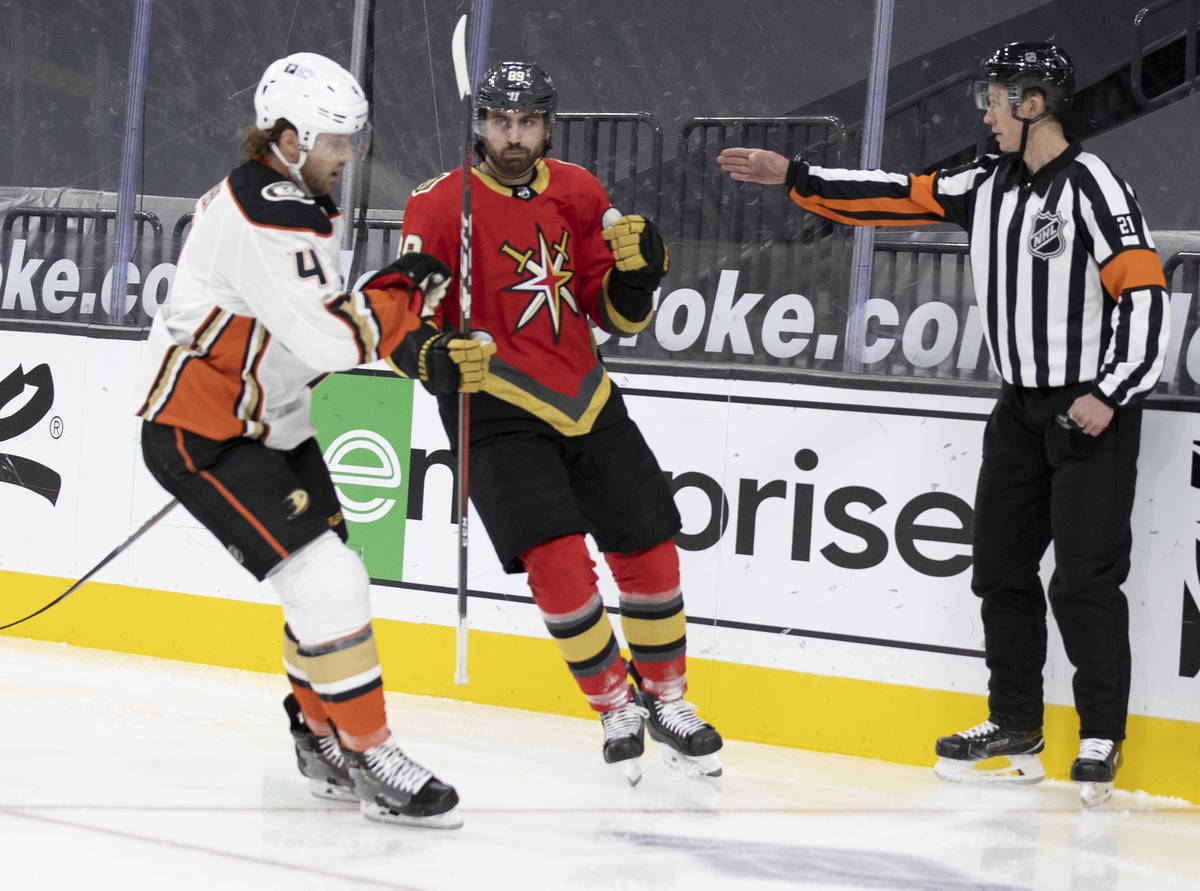 Vegas Golden Knights right wing Alex Tuch (89) celebrates in front of Anaheim Ducks defenseman ...