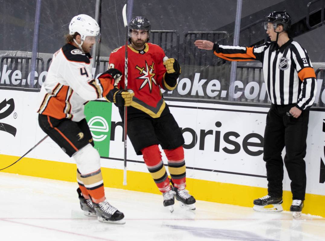 Vegas Golden Knights right wing Alex Tuch (89) celebrates in front of Anaheim Ducks defenseman ...