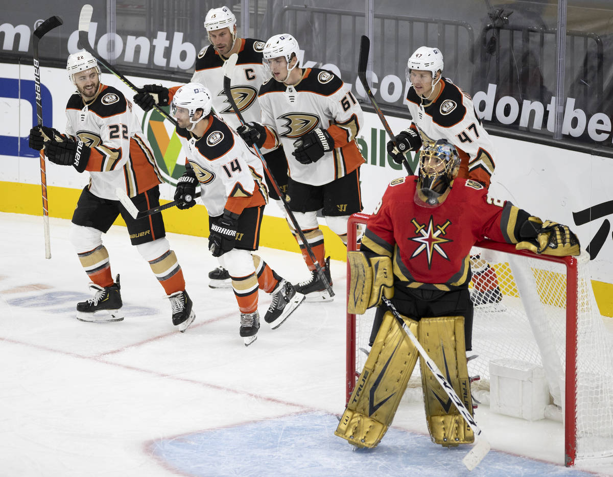 Anaheim Ducks center Adam Henrique (14) celebrates with teammates after scoring a goal against ...