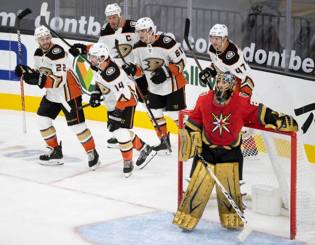 Anaheim Ducks center Adam Henrique (14) celebrates with teammates after scoring a goal against ...