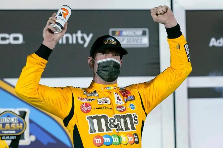 Kyle Busch celebrates in Victory Lane after winning the NASCAR Clash auto race at Daytona Inter ...