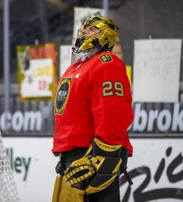 Golden Knights goaltender Marc-Andre Fleury (29) looks up during warm ups before the first peri ...