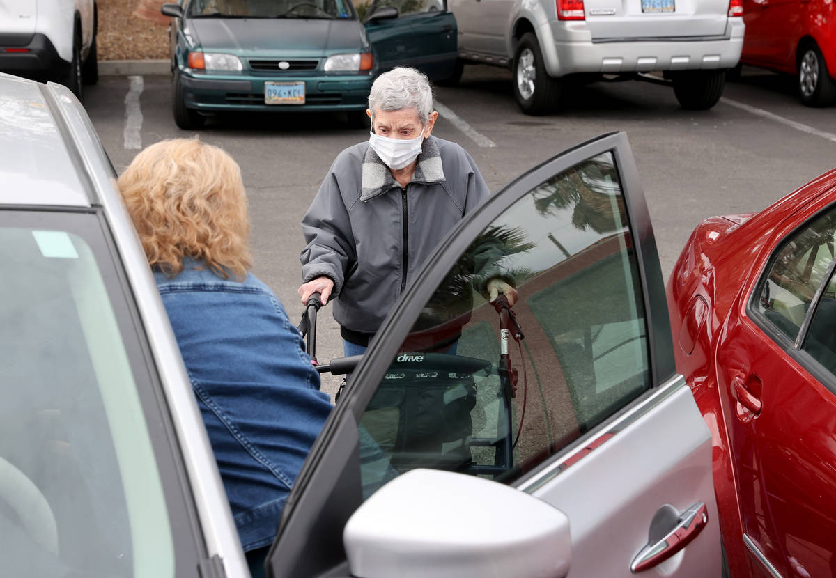 Estelle Roberts, 92, right, gets help from her daughter Dori Roberts-Lombardi, 65, after a doct ...