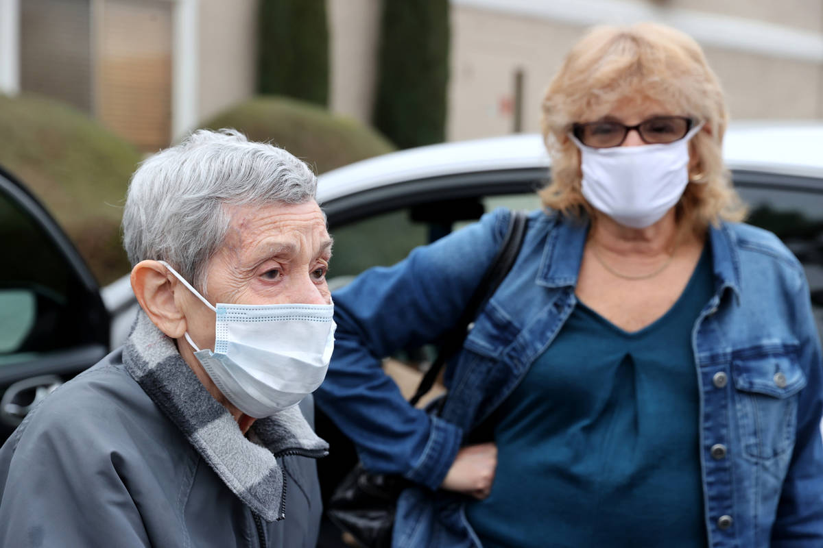 Estelle Roberts, 92, left, and her daughter Dori Roberts-Lombardi, 65, at her Las Vegas assiste ...