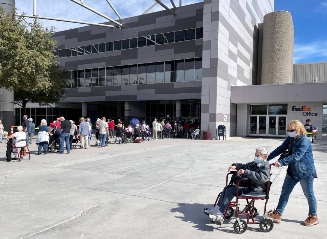 Estelle Roberts, 92, left, and her daughter Dori Roberts-Lombardi, 65, leave the Las Vegas Conv ...