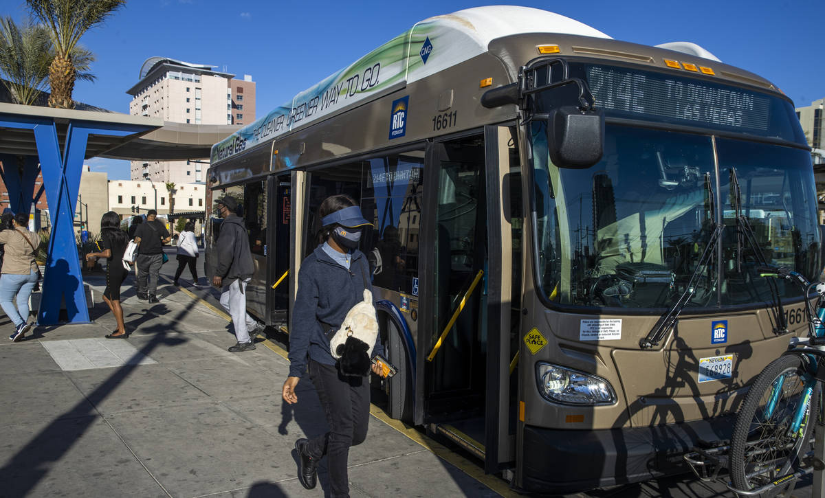 Passengers exit a bus at the Bonneville Transit Center operated by the Regional Transportation ...