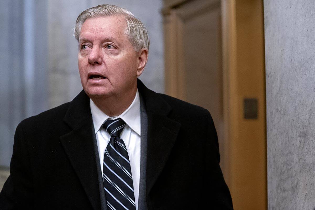 Sen. Lindsey Graham, R-S.C., arrives on Capitol Hill in Washington, Saturday, Feb. 13, 2021, on ...