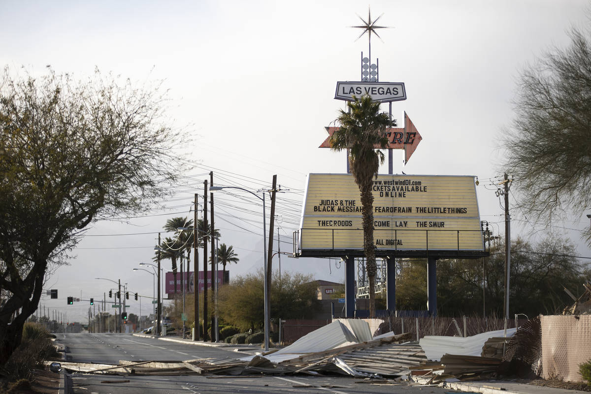 A fallen movie screen from the West Wind Las Vegas Drive-In blocks the westbound lanes of West ...