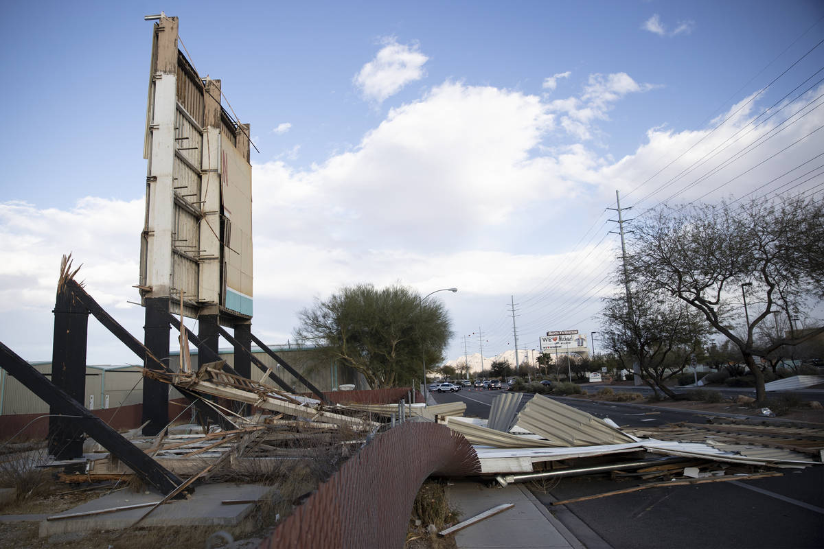 A fallen movie screen from the West Wind Las Vegas Drive-In blocks the westbound lanes of West ...