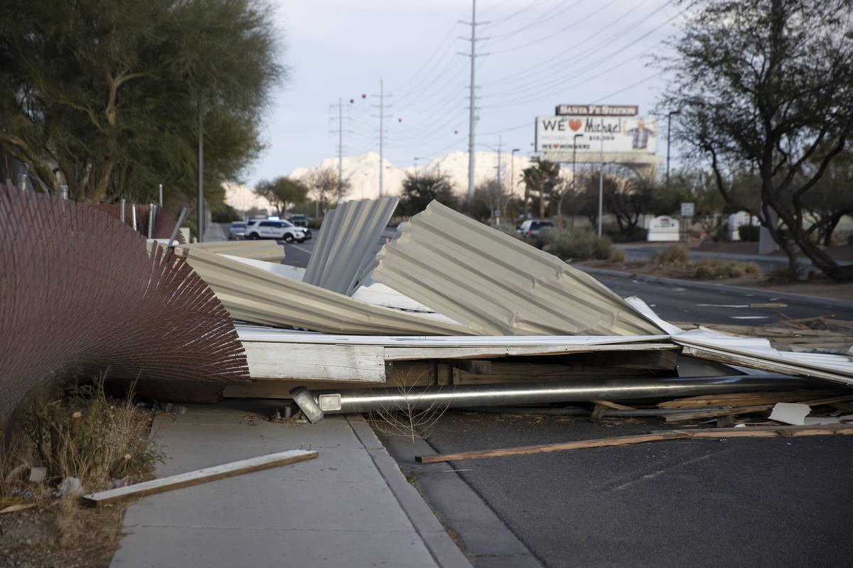 A fallen movie screen from the West Wind Las Vegas Drive-In blocks the westbound lanes of W Car ...