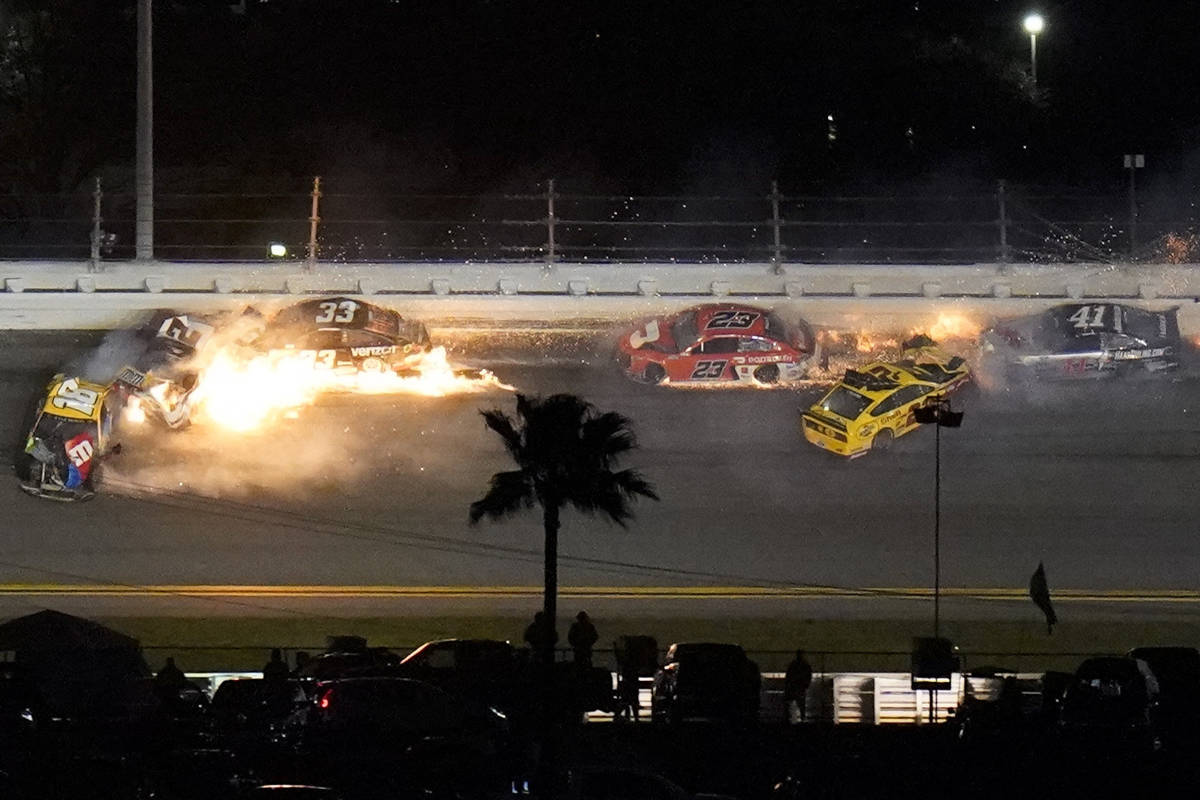 Racers crash during the last lap in the NASCAR Daytona 500 auto race at Daytona International S ...