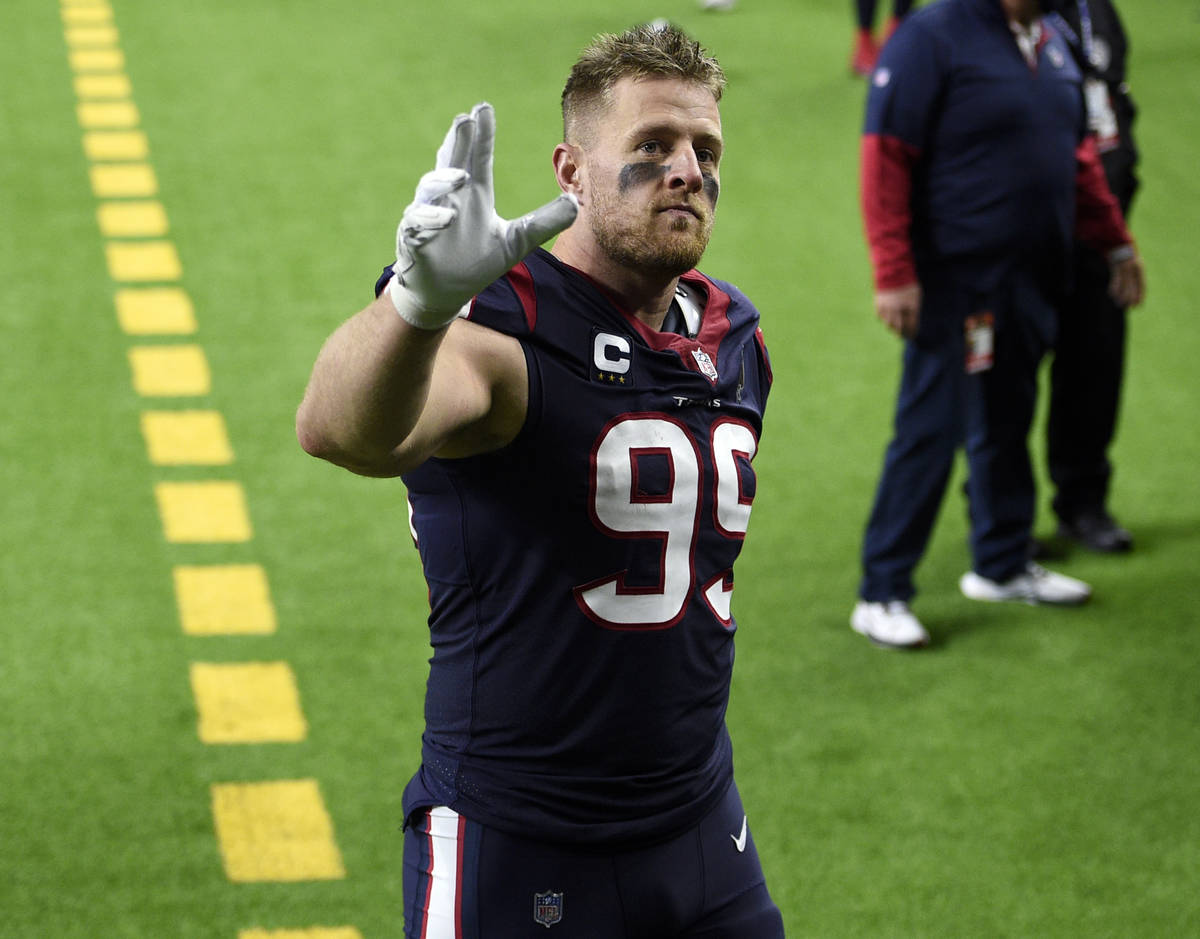 FILE - In this Jan. 3, 2021, file photo, Houston Texans defensive end J.J. Watt (99) waves to f ...
