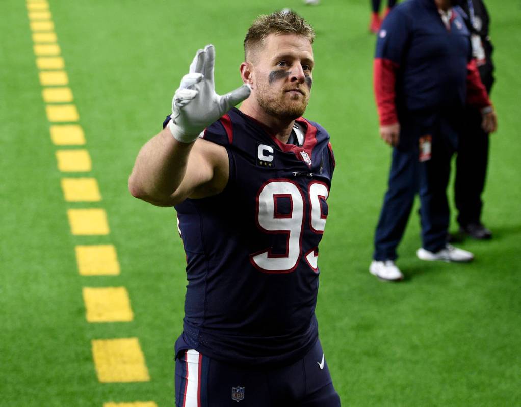 FILE - In this Jan. 3, 2021, file photo, Houston Texans defensive end J.J. Watt (99) waves to f ...