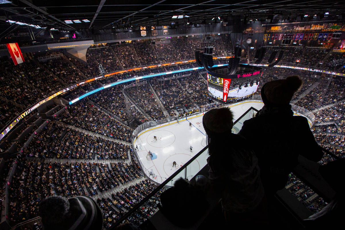 Golden Knights fans watch the action from the Hyde Lounge space at T-Mobile Arena during an NHL ...