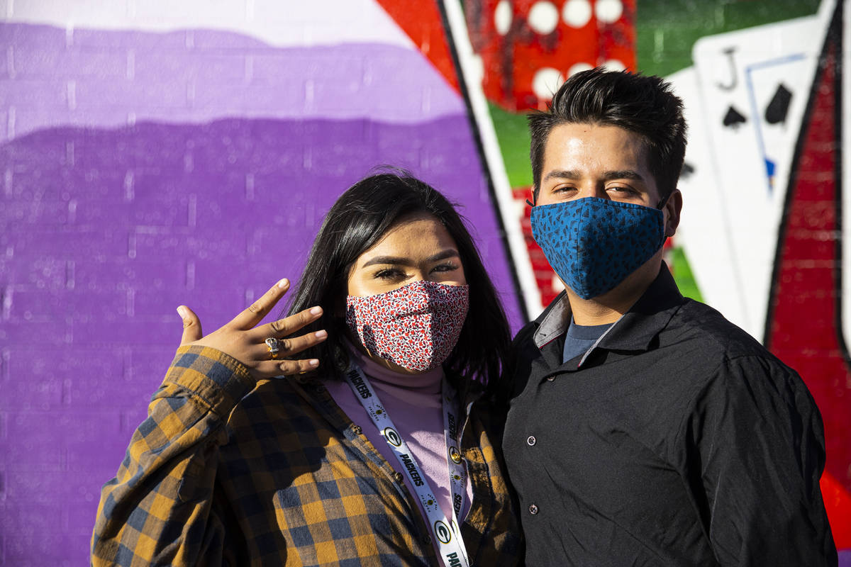 Sara Castro, left, and Robert Schmelzle, both of Las Vegas, poses for a portrait in the Arts Di ...