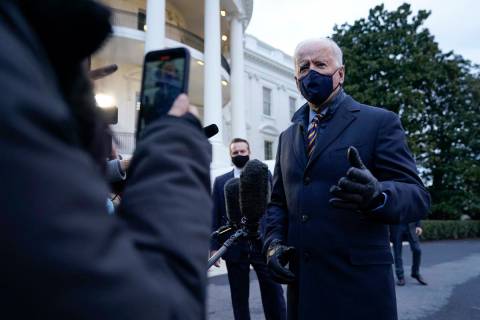 President Joe Biden speaks to reporters on the South Lawn of the White House before boarding Ma ...