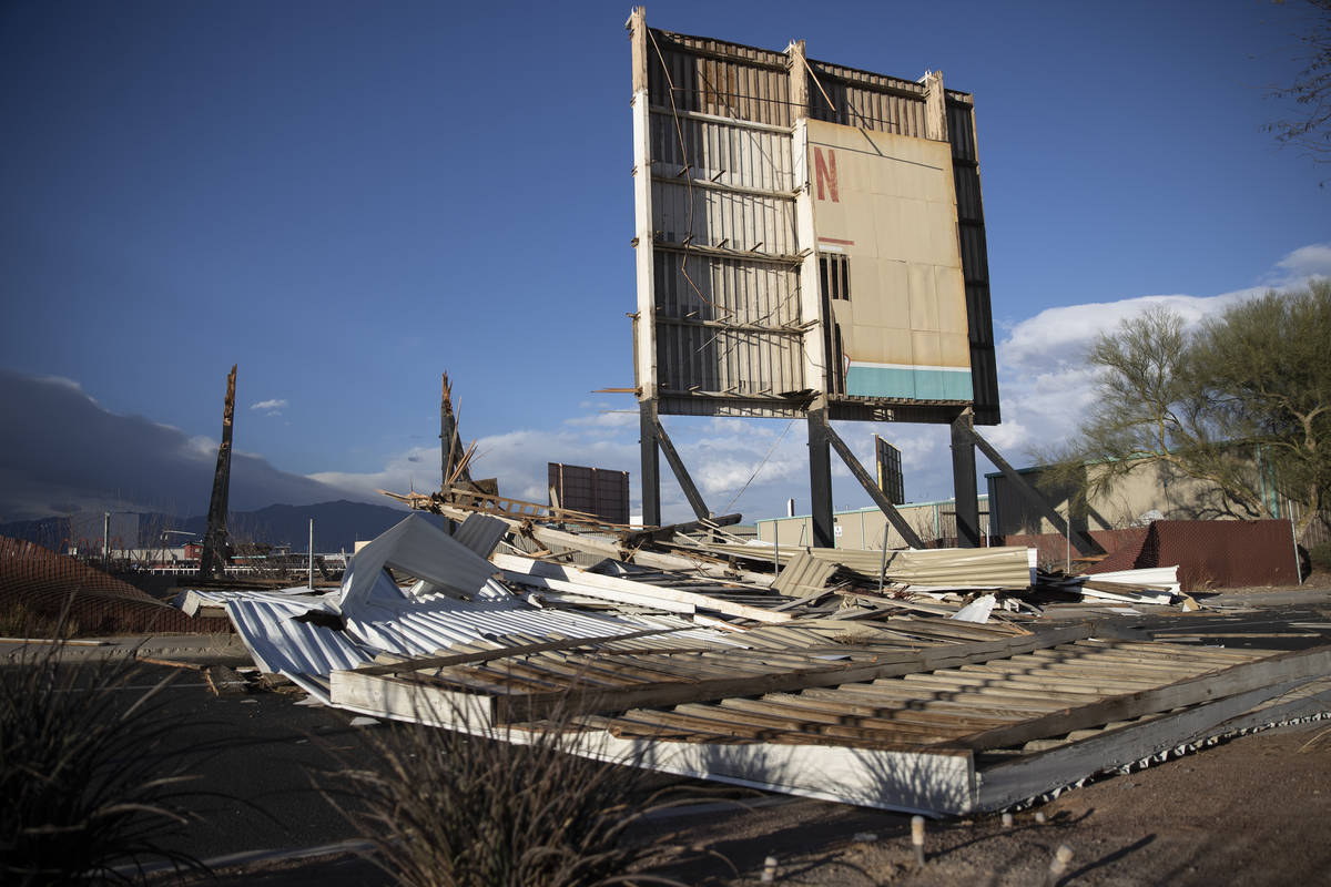 A fallen movie screen from the West Wind Las Vegas Drive-In blocks the westbound lanes of W Car ...