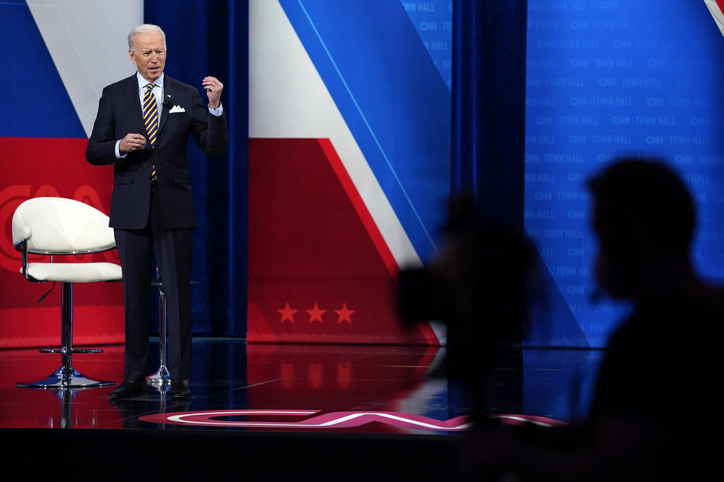 President Joe Biden talks during a televised town hall event at Pabst Theater, Tuesday, Feb. 16 ...