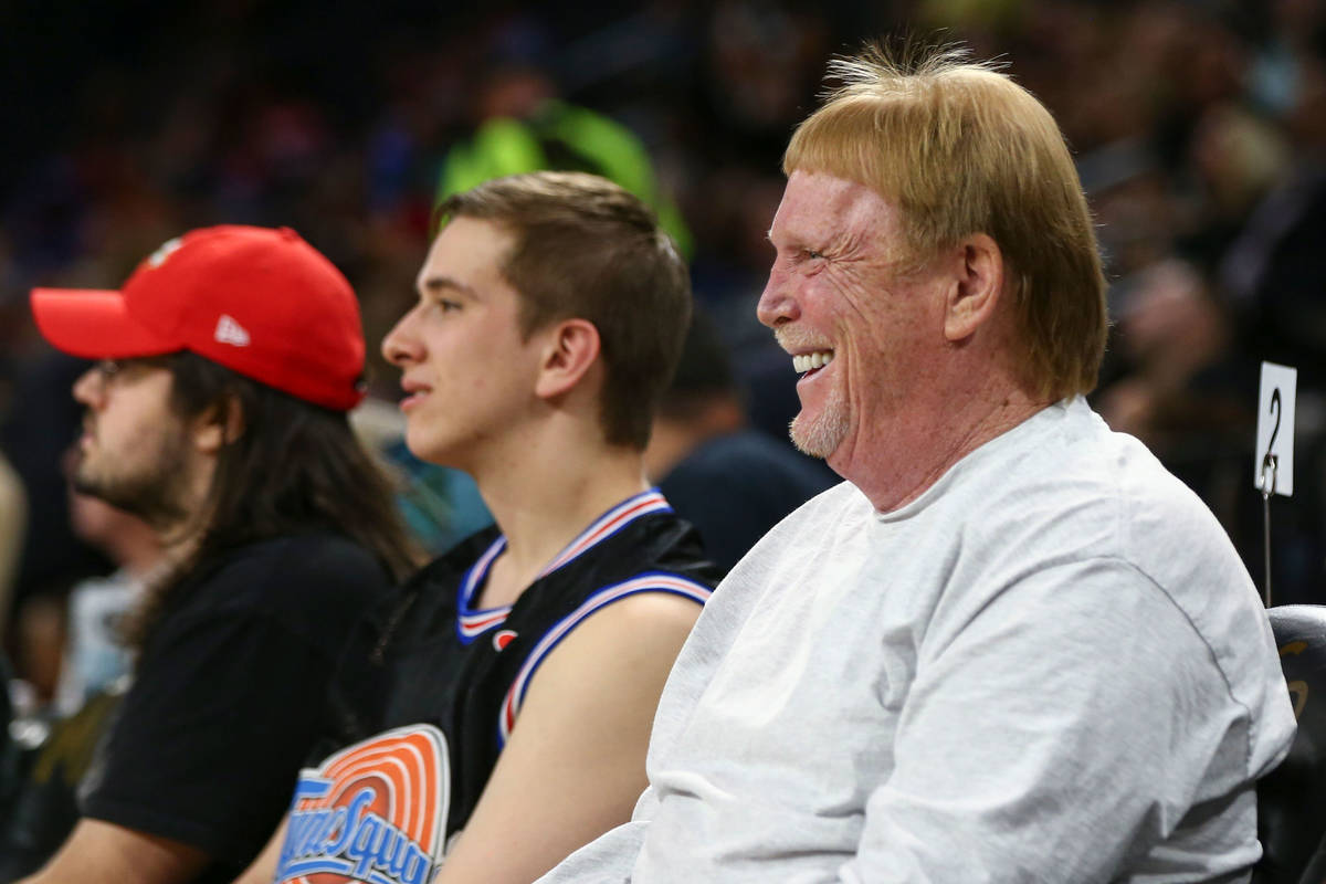 Oakland Raiders owner Mark Davis reacts while attending during the first half of a WNBA basketb ...