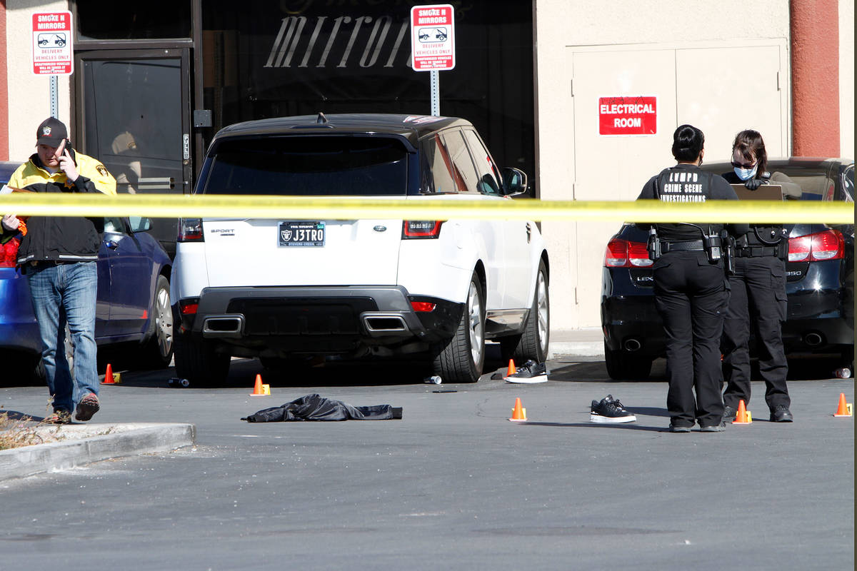 Las Vegas police investigate a homicide, Feb. 20, 2021, near the 6000 block of West Flamingo Ro ...