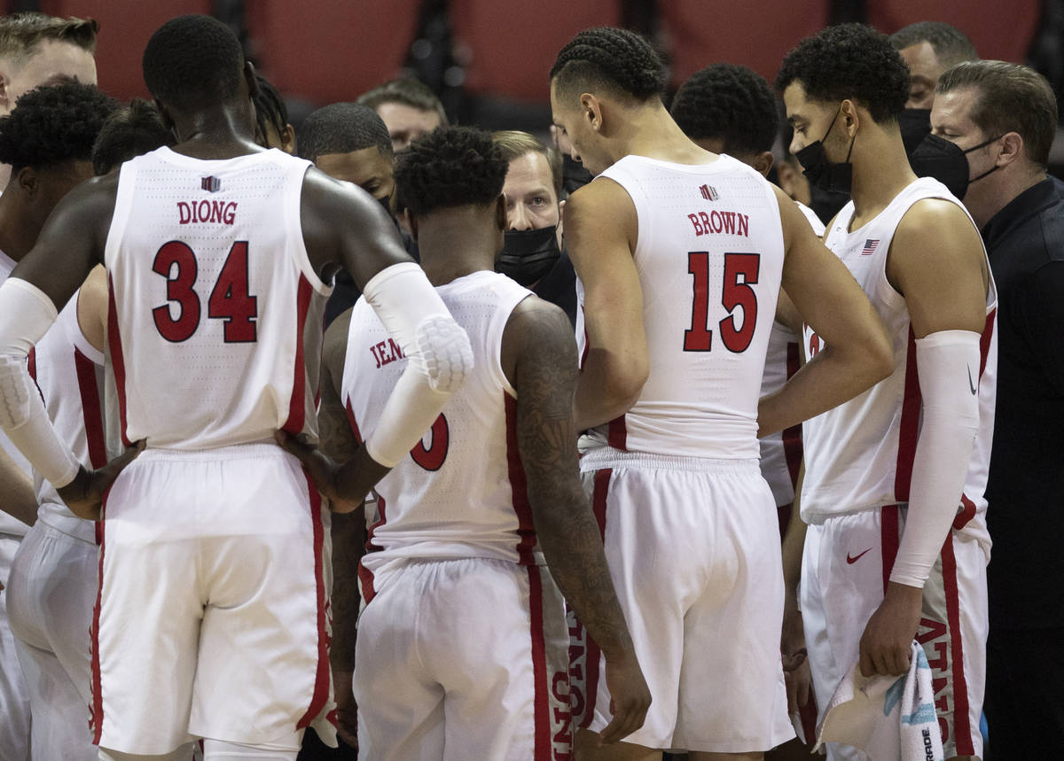 UNLV Rebels head coach T.J. Otzelberger directs his team during a time out in the second half d ...