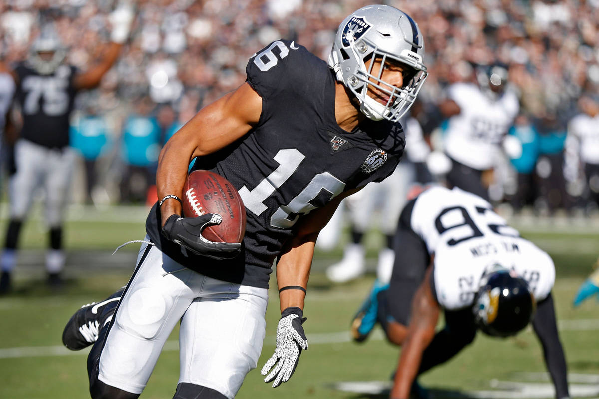 Oakland Raiders wide receiver Tyrell Williams runs with the ball for a touchdown past Jacksonvi ...