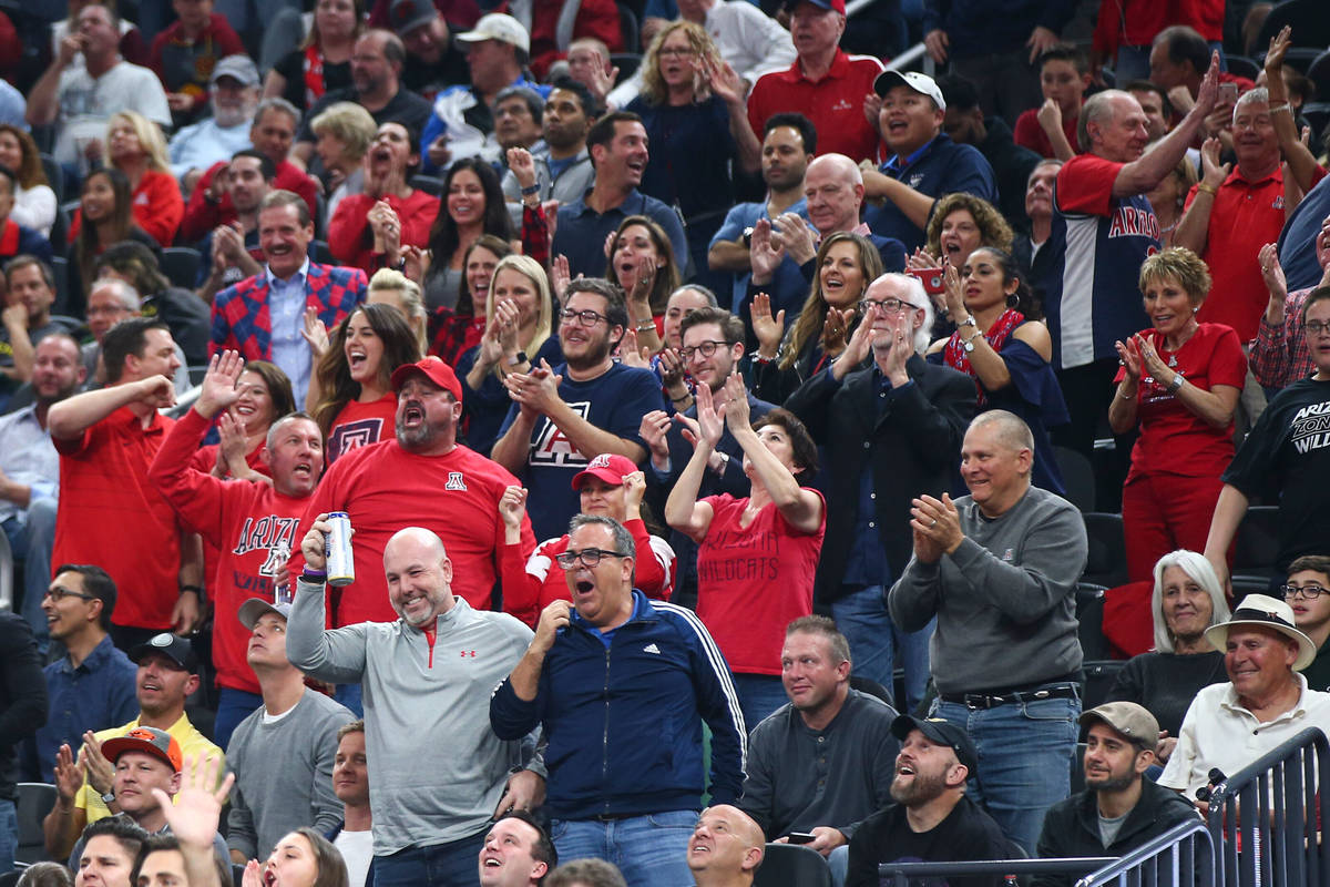 Arizona Wildcats fans react as their team plays the USC Trojans during the Pac-12 tournament ch ...