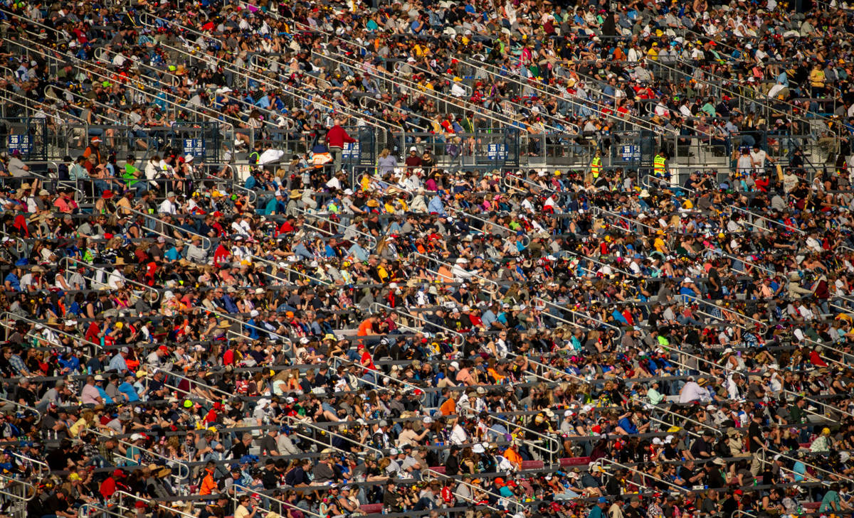 Thousands of fans pack the stands during the Pennzoil 400 presented by Jiffy Lube, a NASCAR Cup ...