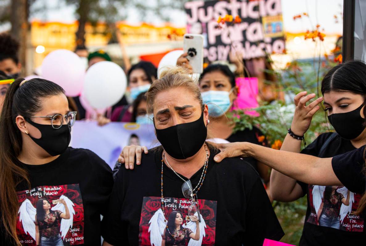 Aracely Palacio, center, is comforted while talking about her daughter Lesly Palacio, who was f ...