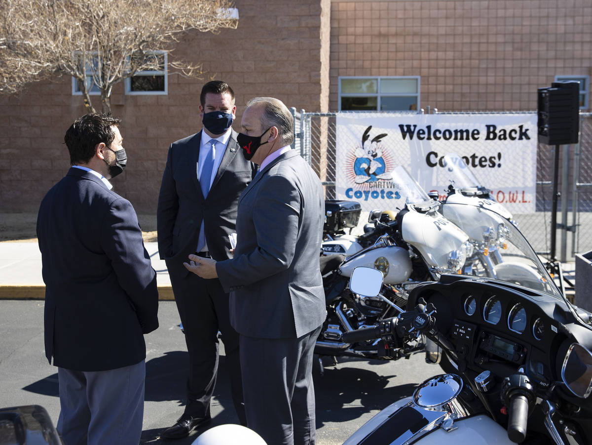 Clark County School District Superintendent Jesus Jara, right, chats with Commissioner Michael ...