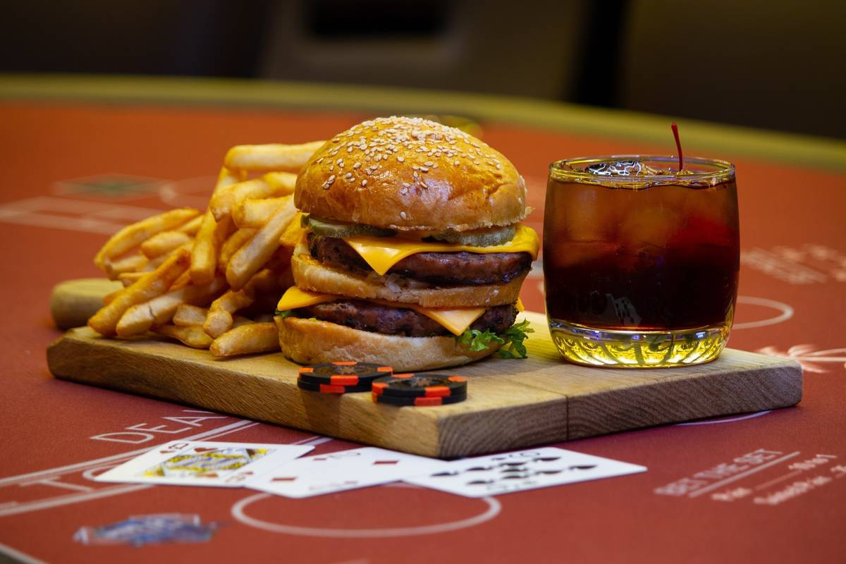 Double Down Burger and Jack in Black Cocktail at the Rampart Casino at the Resort at Summerlin. ...