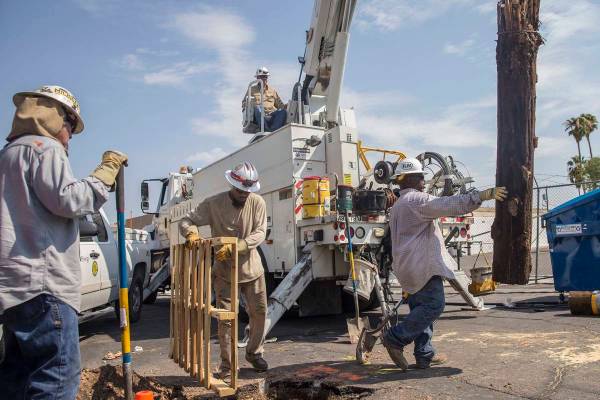 NV Energy crews work to restore power in this Aug., 12, 2018, file photo. (Benjamin Hager/Las V ...