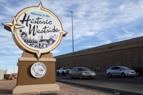 Traffic moves past the newly placed "Welcome to the Historic Westside" sign off of US95 and Mar ...