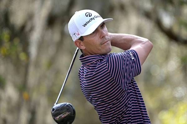 Billy Horschel watches his tee shot on the ninth hole during the final round of the Workday Cha ...