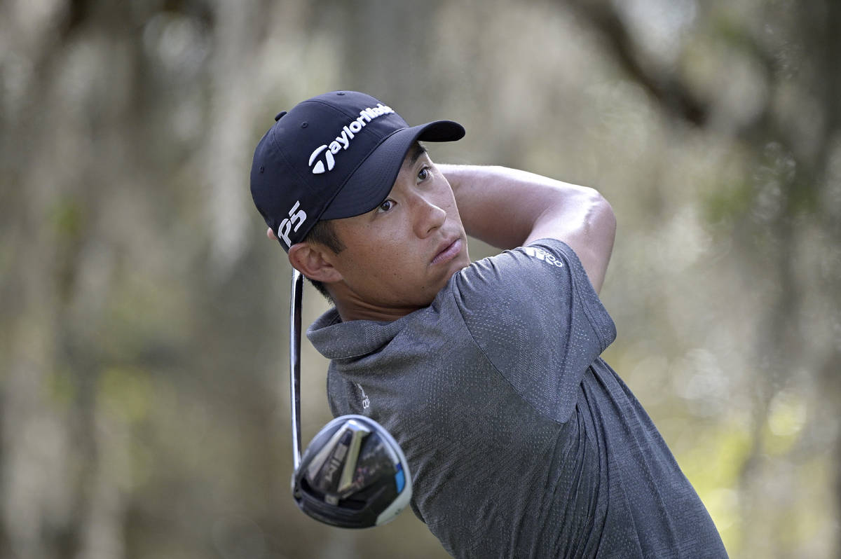 Collin Morikawa watches his tee shot on the ninth hole during the final round of the Workday Ch ...