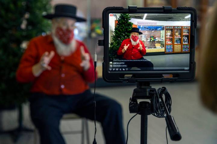 Mark Hall-Patton conducts a Facebook Live session within the former Boulder City Depot building ...