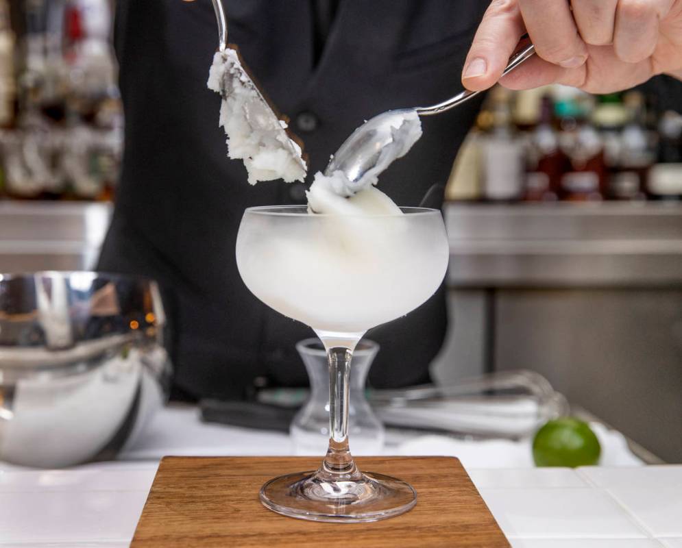 LN2 Caipirinha is made with Avuá cachaça and fresh lime, made tableside with liquid nitrogen ...