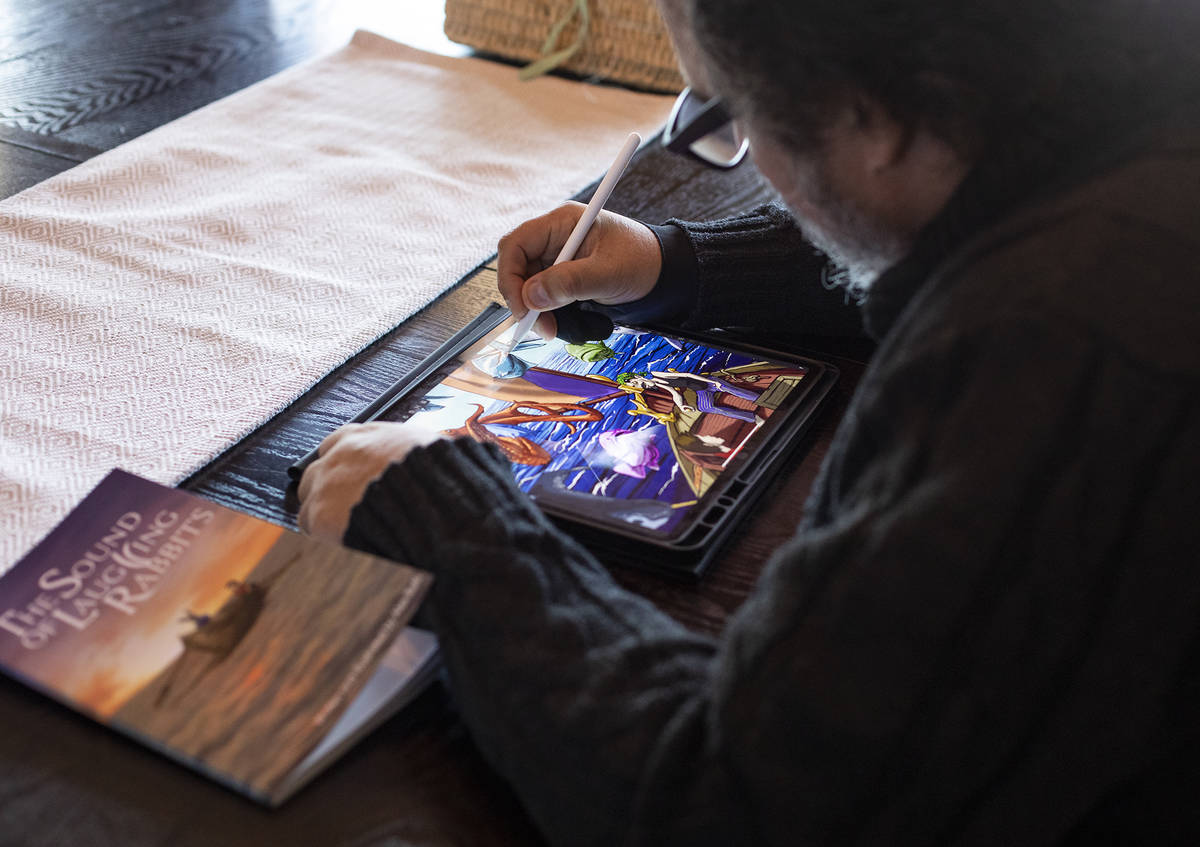 Author and illustrator Alex Raffi draws on his iPad at his home in Henderson. (Rachel Aston/Las ...