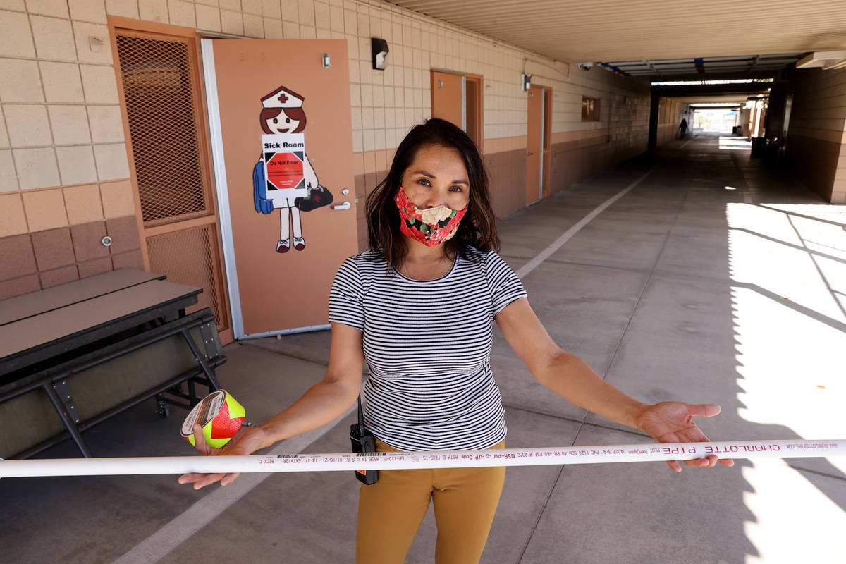 Golda Gilliam, assistant principal at Dearing Elementary School in Las Vegas, show a six-foot l ...