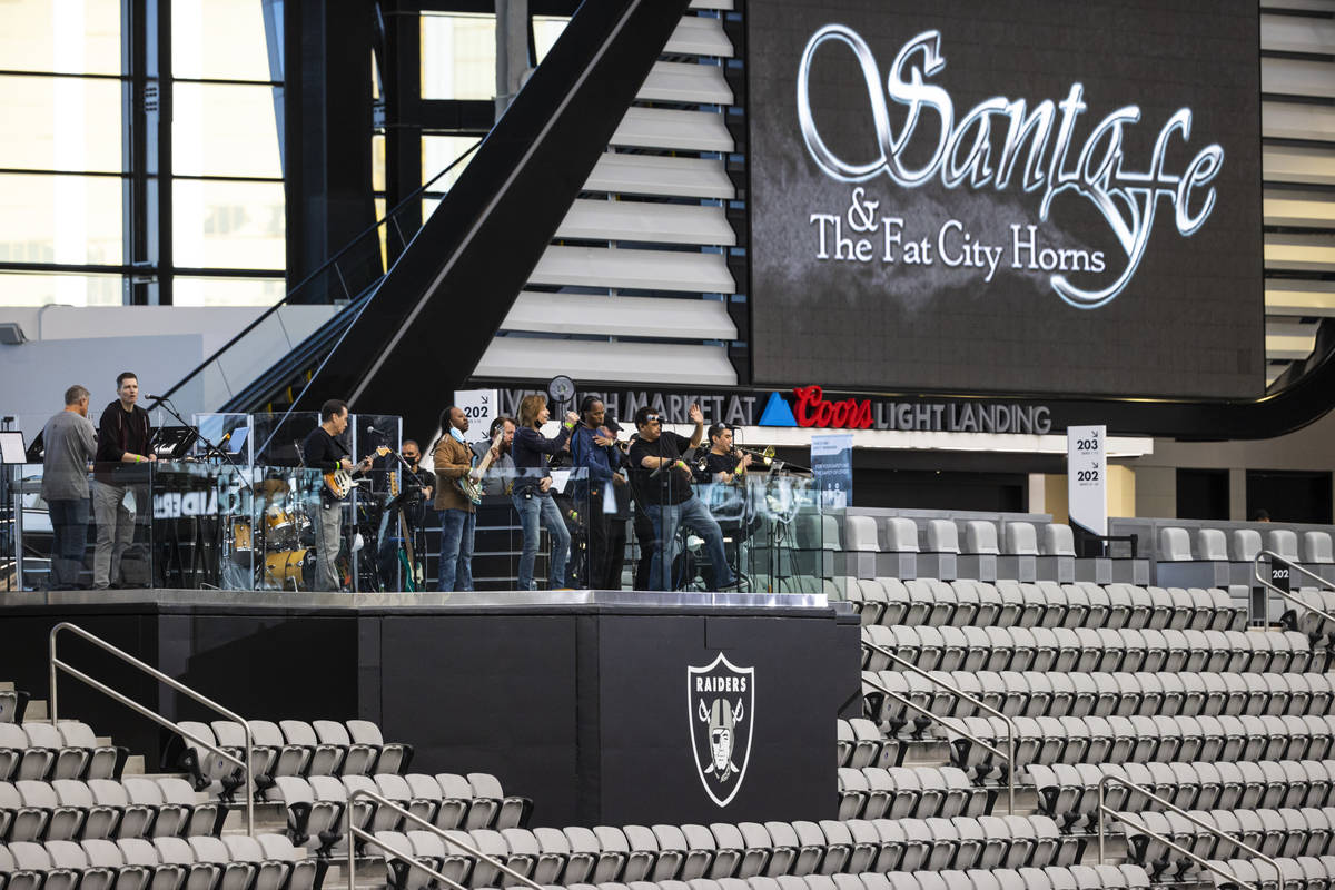 Members of Santa Fe & The Fat City Horns perform during soundcheck at Allegiant Stadium in ...