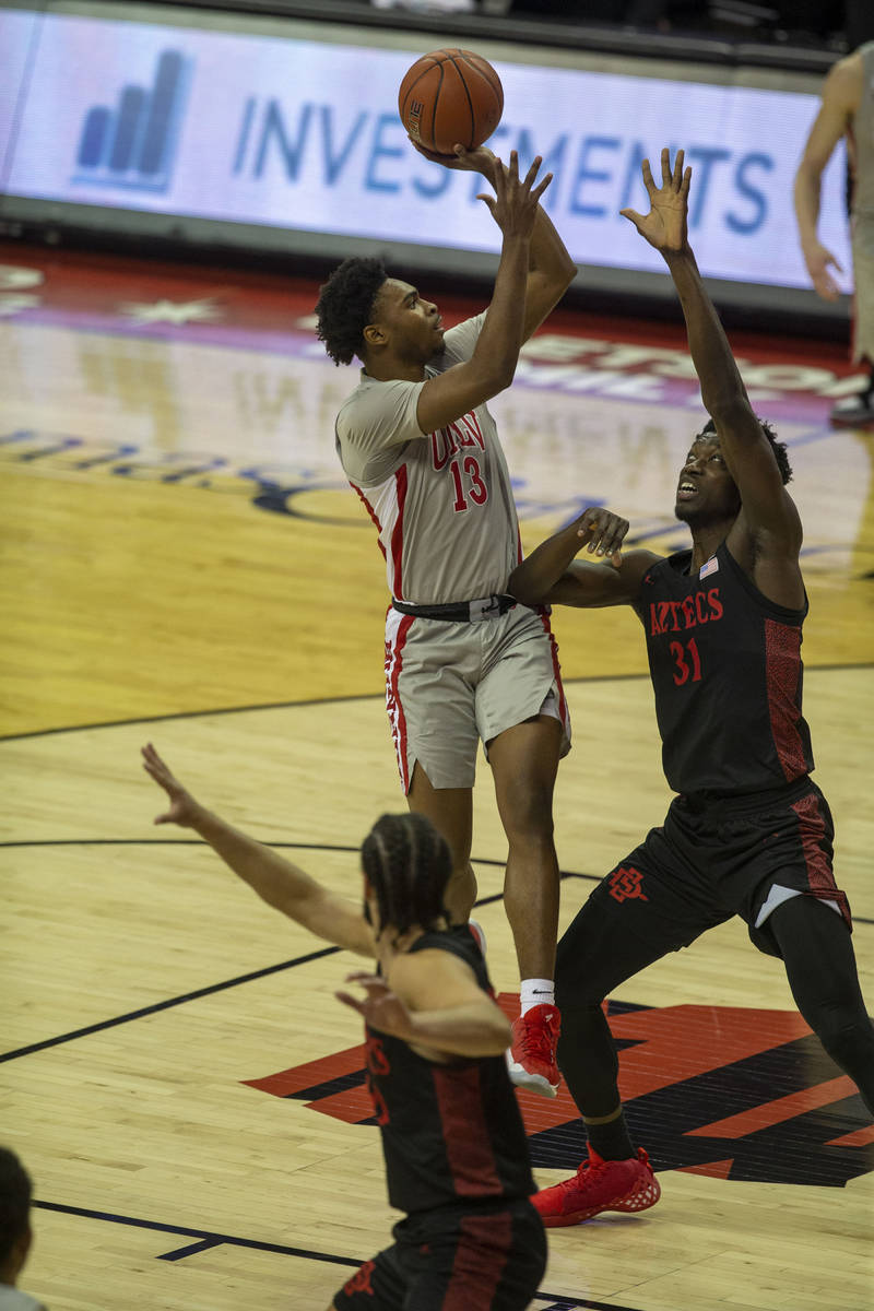 UNLV Rebels guard Bryce Hamilton (13) shoots the basketball against San Diego State Aztecs forw ...